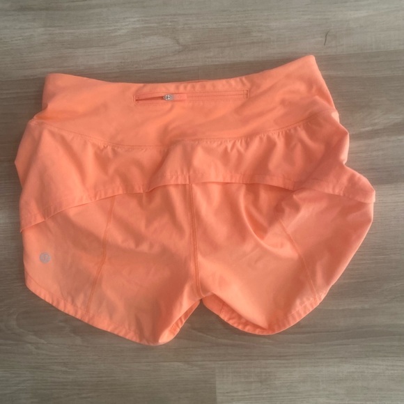 Lululemon orange shorts, size 4-6. Never worn. - Picture 4 of 4